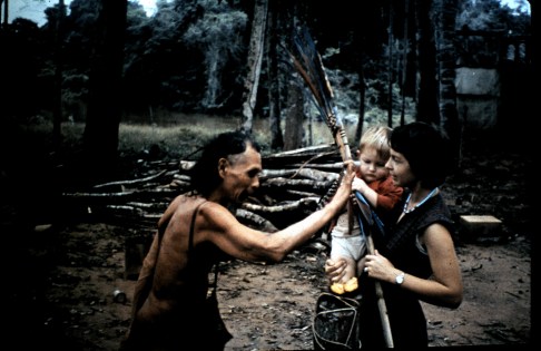 James-Gill-in-the-arms-of-his-mother-Elsie-receives-a-“first-gift”-from-an-Araona-India-chief-in-Bolivia.-Courtesy-of-James-Gill